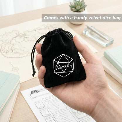 Iridescent purple resin polyhedral D&D dice set with mylar shimmer and velvet bag