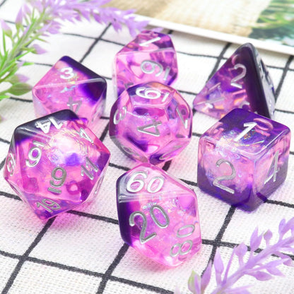 Iridescent purple resin polyhedral D&D dice set with mylar shimmer and velvet bag