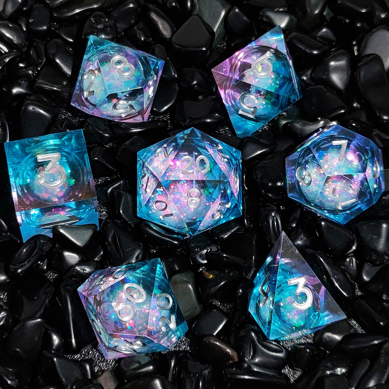 Quicksand liquid-core resin polyhedral D&D dice set in multiple colorways