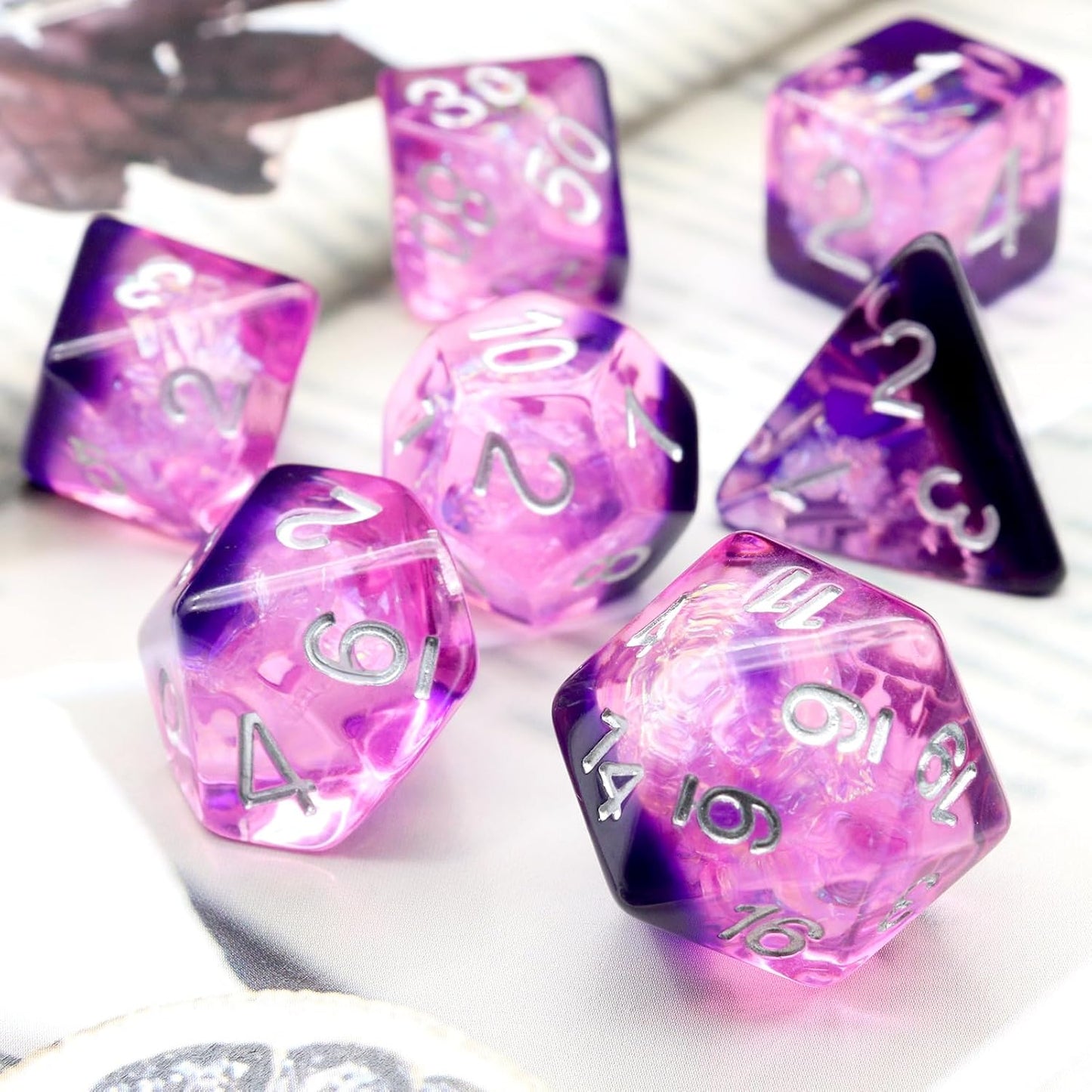Iridescent purple resin polyhedral D&D dice set with mylar shimmer and velvet bag