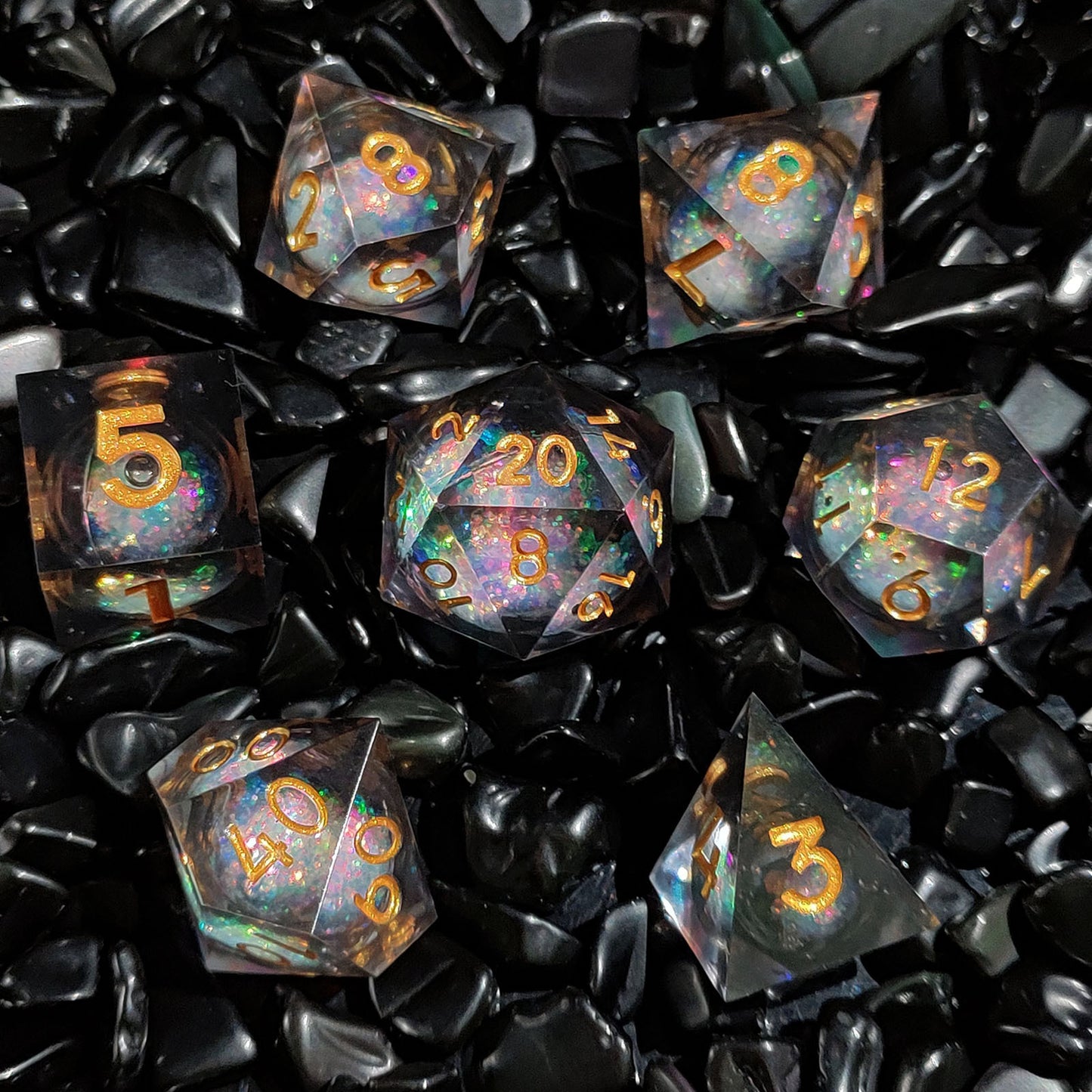 Quicksand liquid-core resin polyhedral D&D dice set in multiple colorways