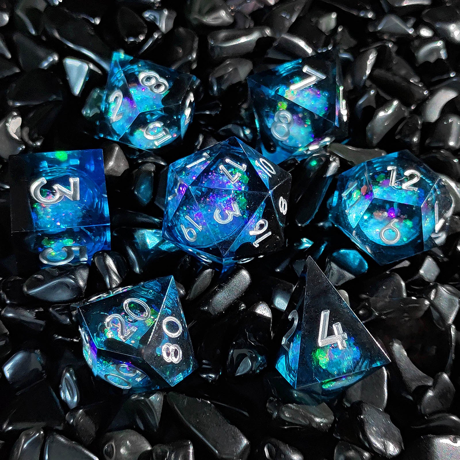 Quicksand liquid-core resin polyhedral D&D dice set in multiple colorways