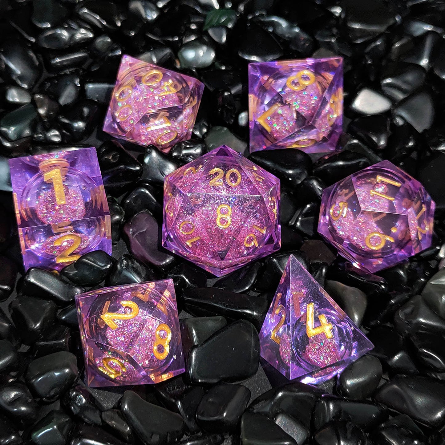 Quicksand liquid-core resin polyhedral D&D dice set in multiple colorways